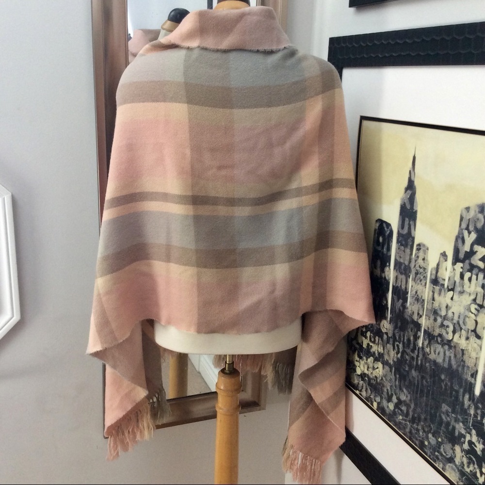 Pink and grey plaid blanket scarf with fringe.